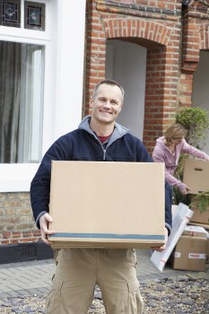 Removal team helping with a home move in Chessington