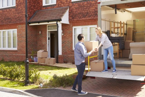 House moving team working in a Chessington residential street