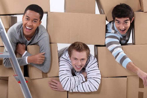 Local removal van helping with furniture transport