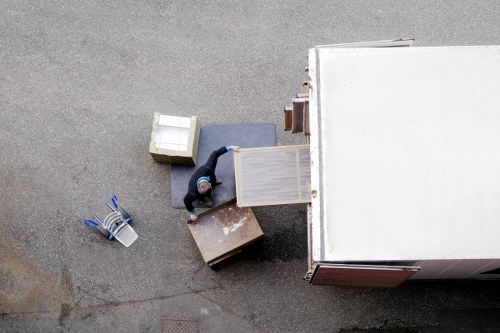 Household boxes and removal equipment ready for loading in Chessington