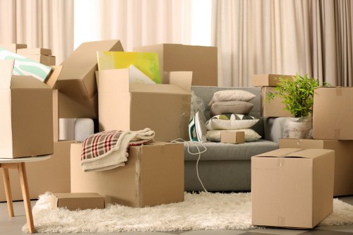 Unpacking boxes into a new Chessington property after moving